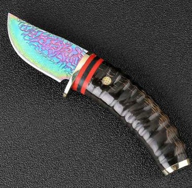 Hunting forged Damascus knife