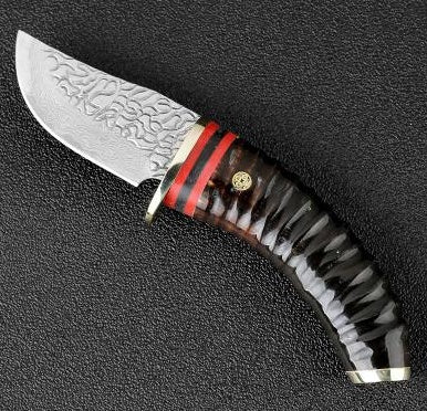 Hunting forged Damascus knife